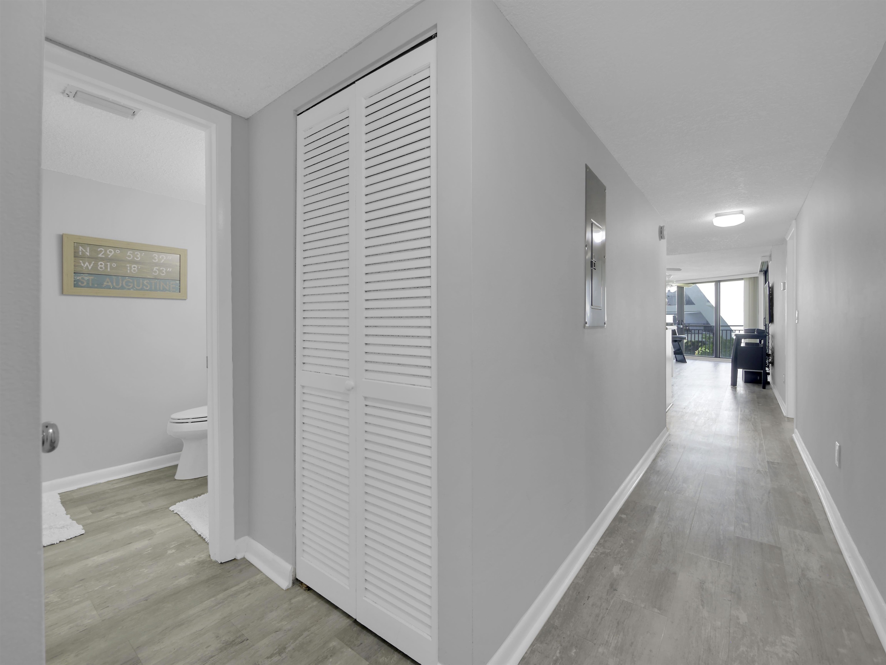 2 Dondanville Road, Unit 211 St. Augustine, FL 32080 - Photo 7 of 30 a view of a hallway with a livingroom and a bathroom