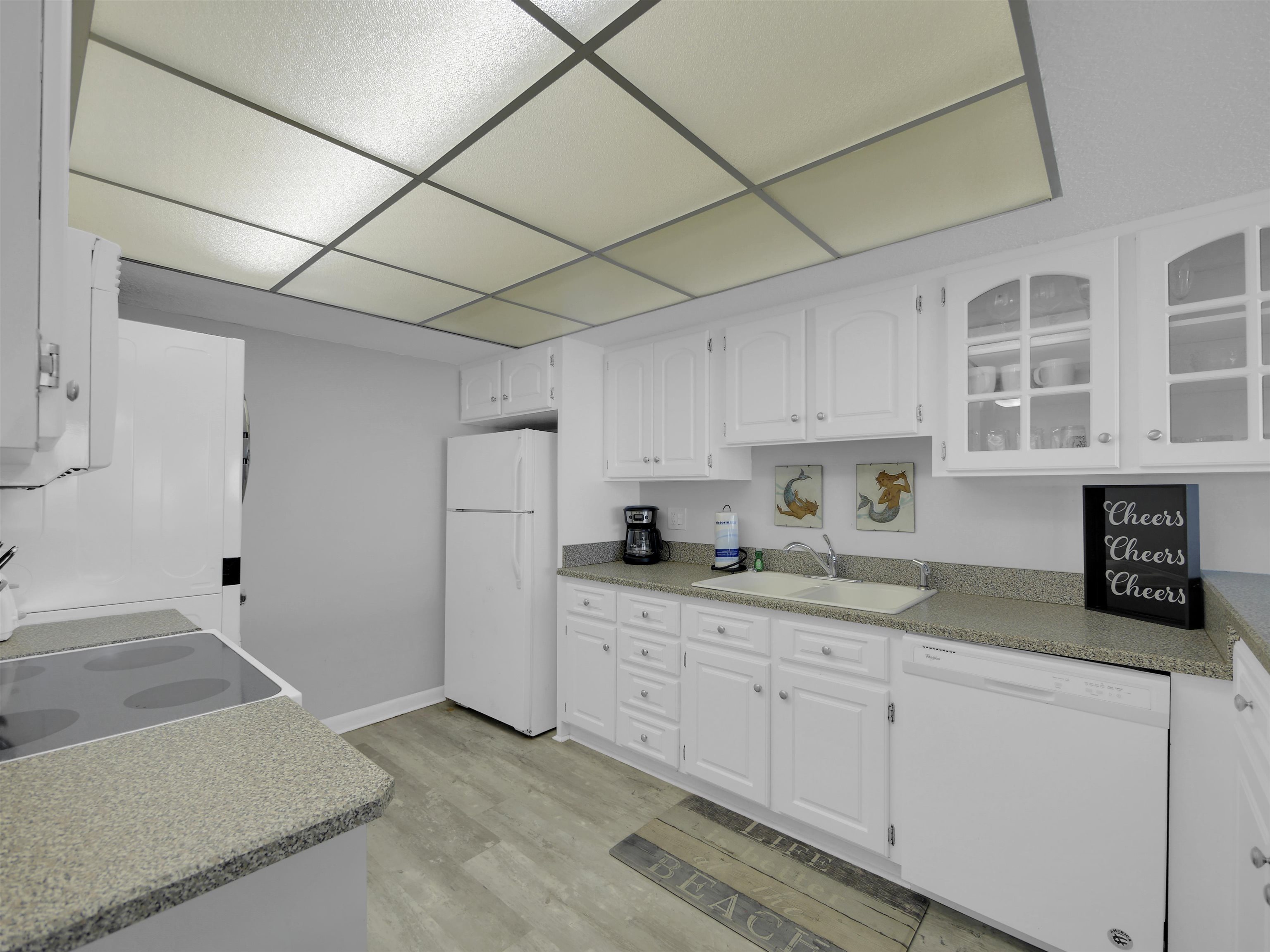 2 Dondanville Road, Unit 211 St. Augustine, FL 32080 - Photo 10 of 30 a kitchen with cabinets and window