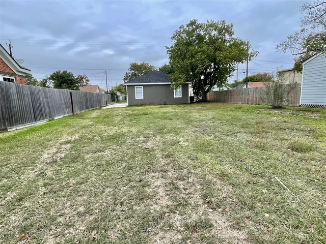 a house view with a garden space
