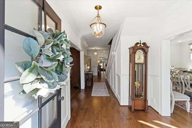 a view of a livingroom with furniture window and wooden floor