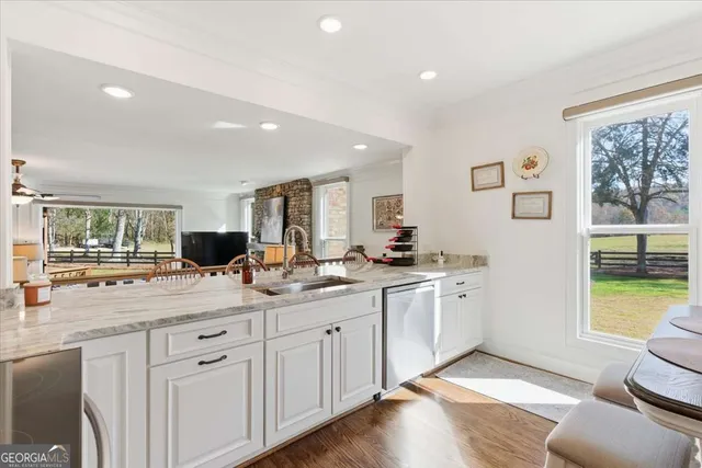 a bathroom with a sink double vanity and a mirror