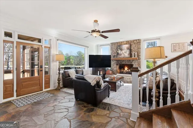 a white toilet sitting next to a white wall