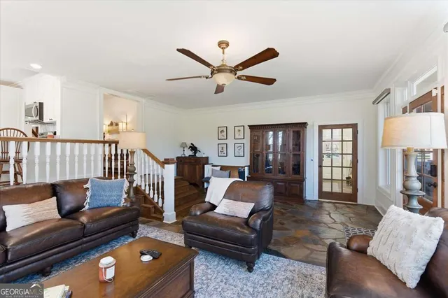 a white toilet sitting next to a shower