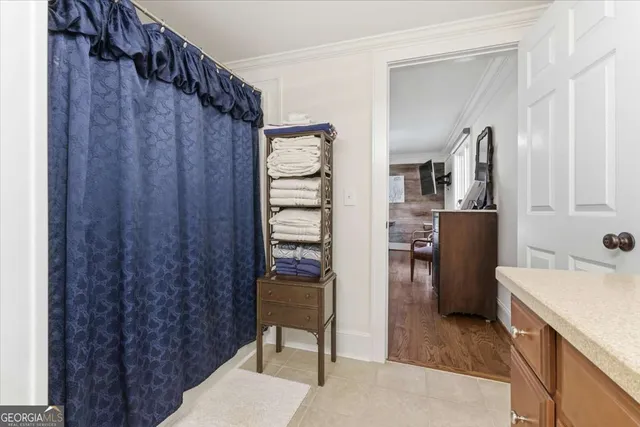 a view of a big yard with a house in the background