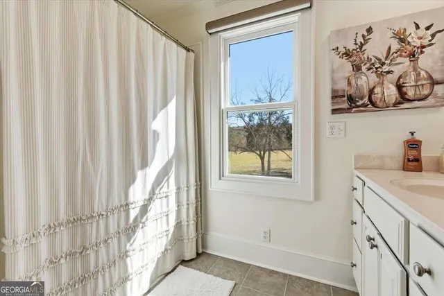 a view of lake with a yard