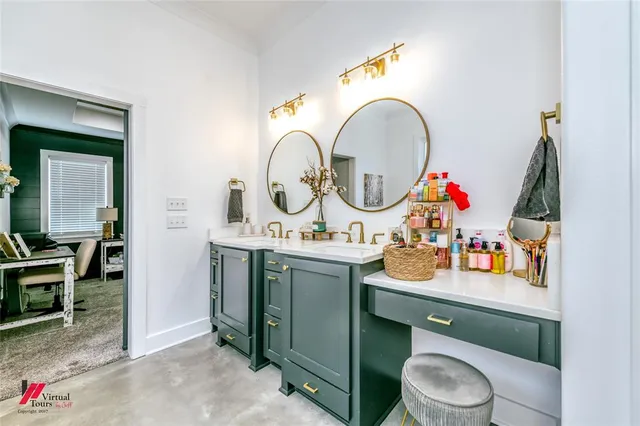a utility room with sink dryer and washer