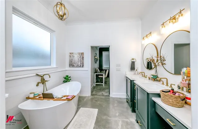 a bath room with a sink and a mirror