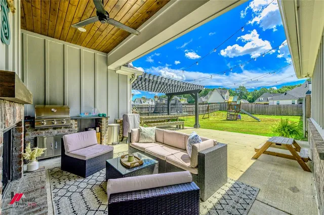 a outdoor living space with furniture and garden view