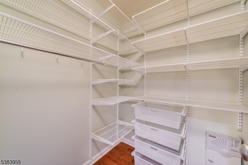 300 Main Street, Unit 716 Little Falls, NJ 07424 - Photo 17 of 24 a view of an empty walk in closet