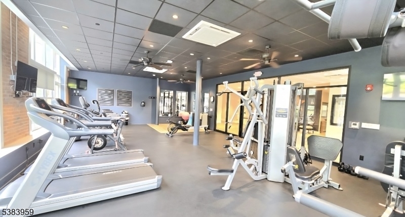 300 Main Street, Unit 716 Little Falls, NJ 07424 - Photo 22 of 24 a view of a room with gym equipment