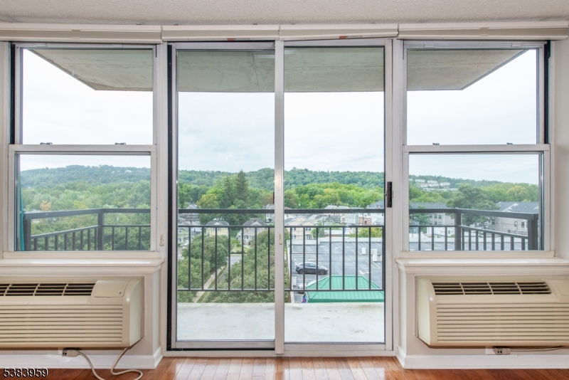 300 Main Street, Unit 716 Little Falls, NJ 07424 - Photo 3 of 24 a view of a city from a window