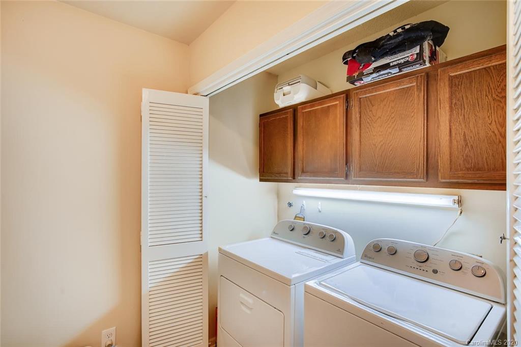 2147 Manawa Lane Tega Cay, SC 29708 - Photo 20 of 28 a utility room with dryer and washer