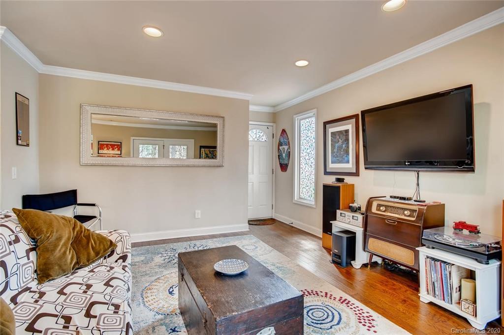 2147 Manawa Lane Tega Cay, SC 29708 - Photo 5 of 28 a bedroom with furniture and a flat screen tv