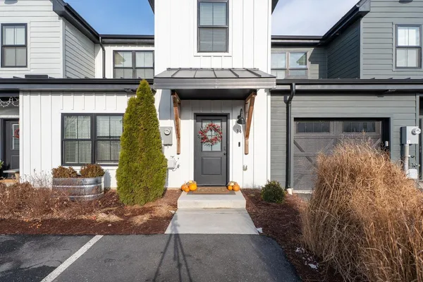 a front view of a house with a porch