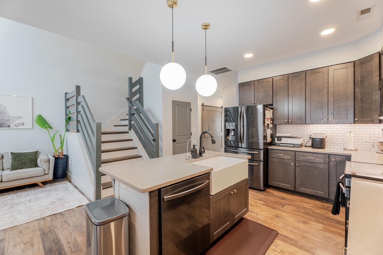 34 Field Court Bridgewater, VA 22812 - Photo 15 of 42 a kitchen with sink cabinets and stainless steel appliances