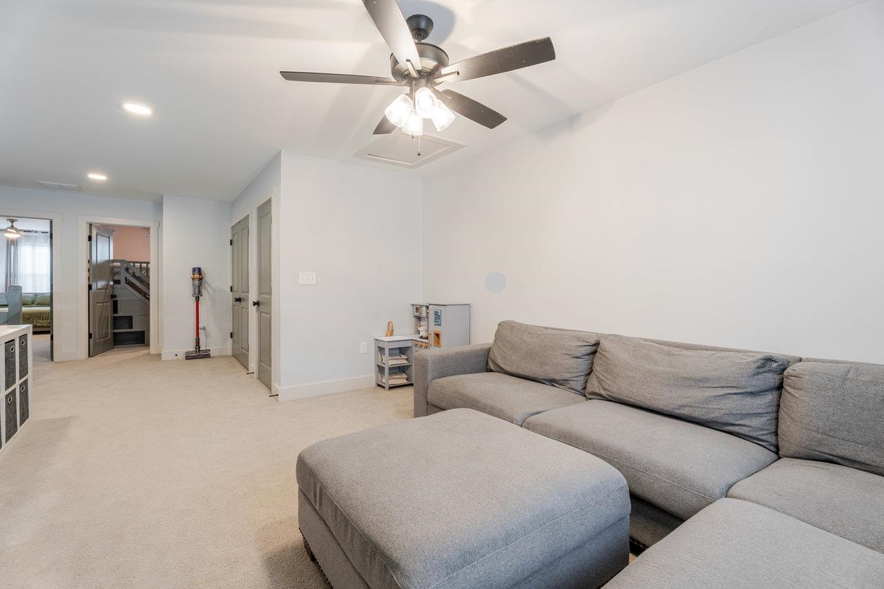 34 Field Court Bridgewater, VA 22812 - Photo 29 of 42 a living room with furniture and a ceiling fan