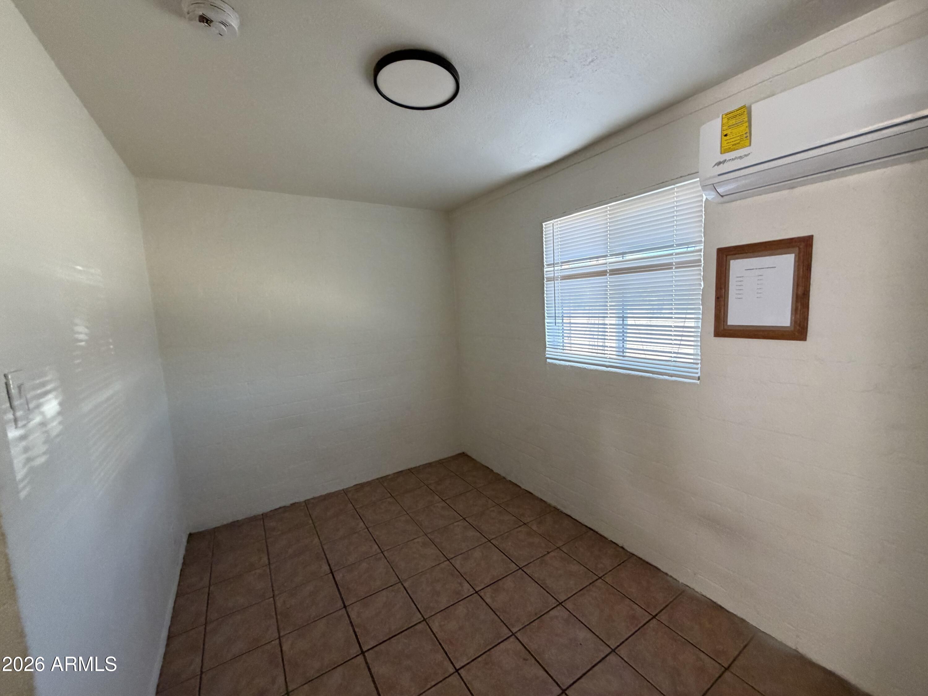 712 West Fillmore Street Phoenix, AZ 85007 - Photo 5 of 5 a view of an empty room and window
