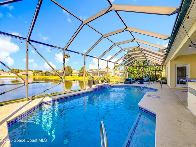 a view of a balcony with chairs