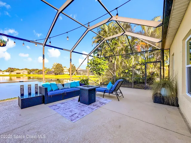 a front view of house with yard and seating area