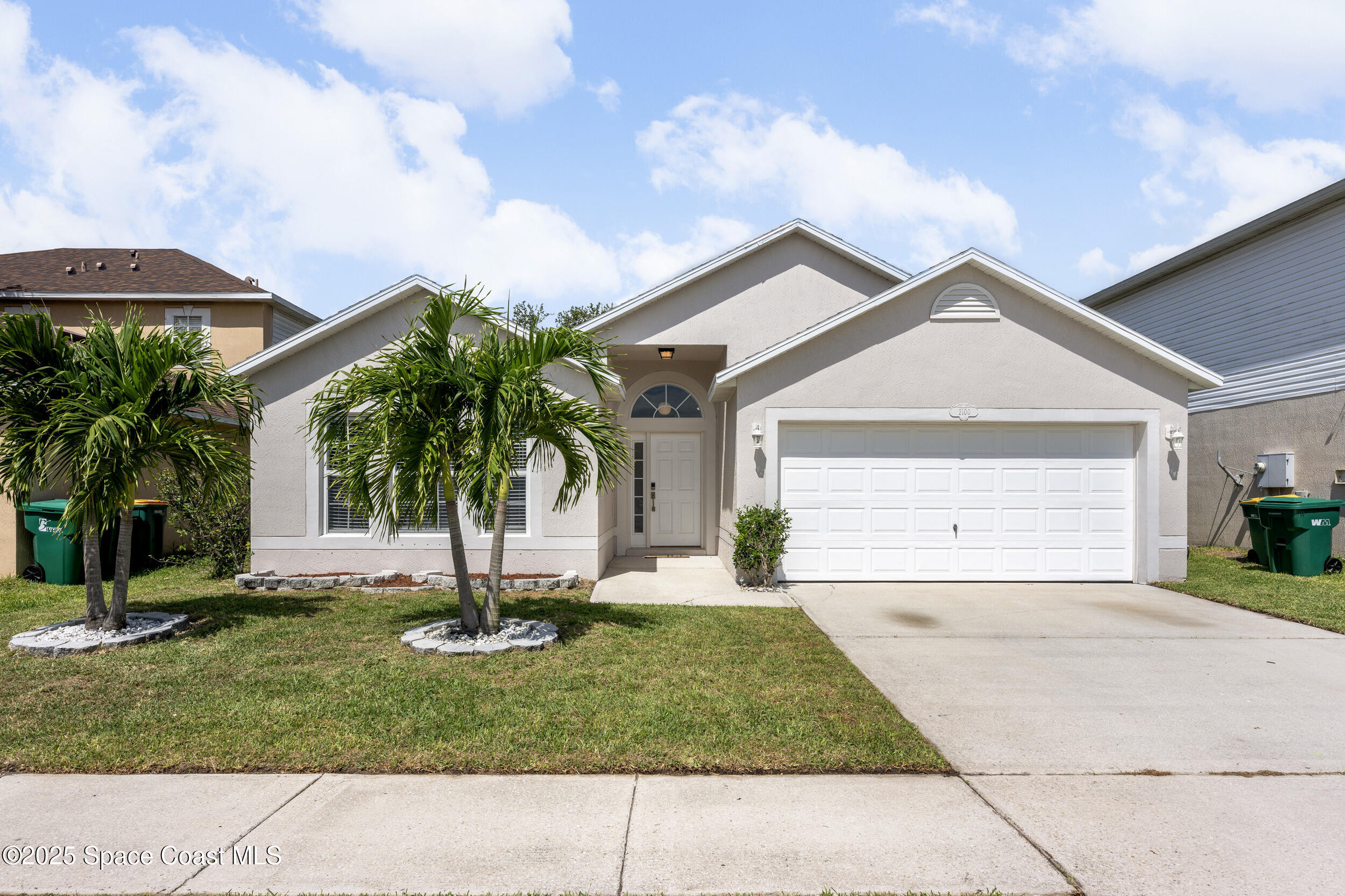 a house view with a garden space