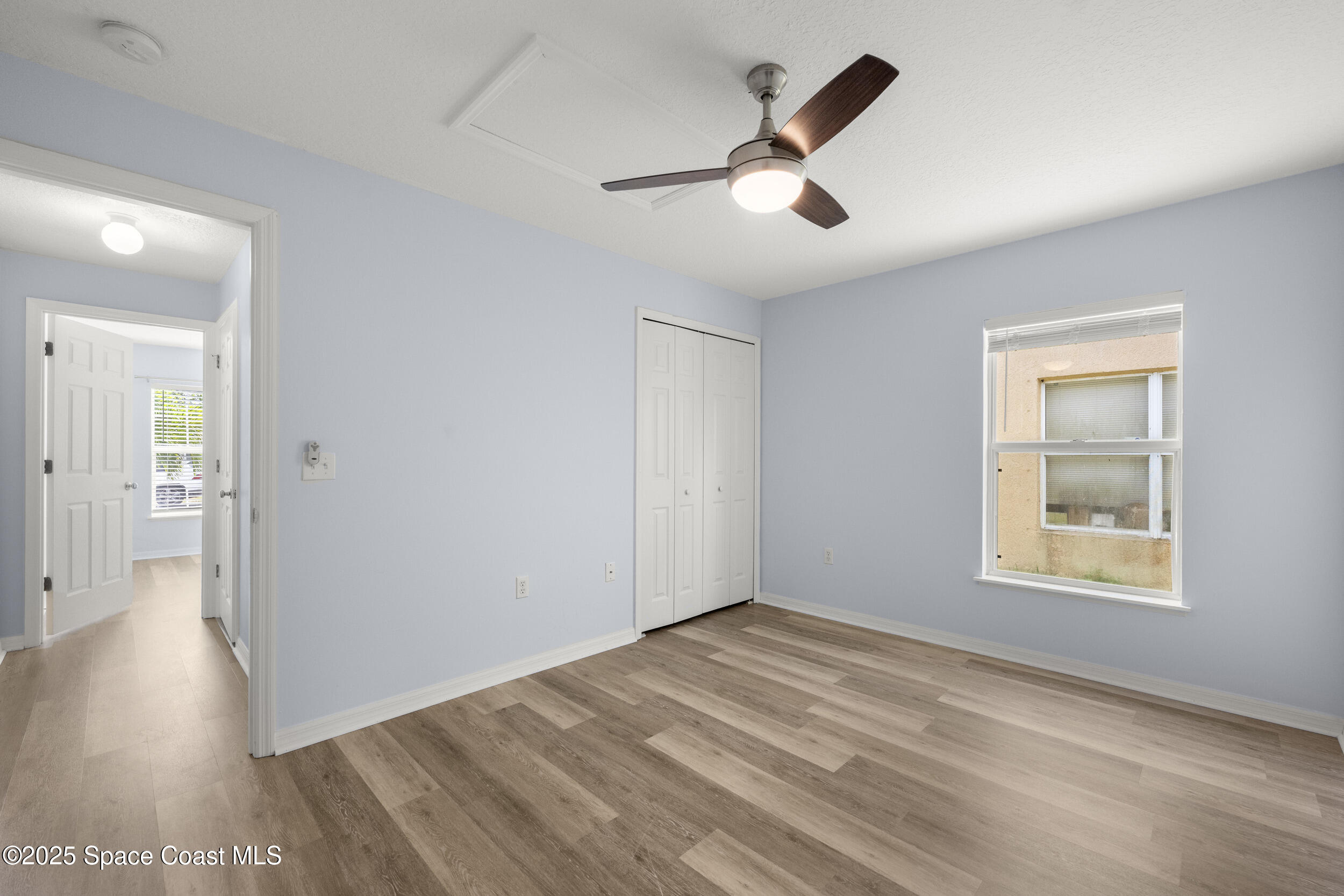2100 Canopy Drive Melbourne, FL 32935 - Photo 13 of 53 wooden floor in an empty room with a window