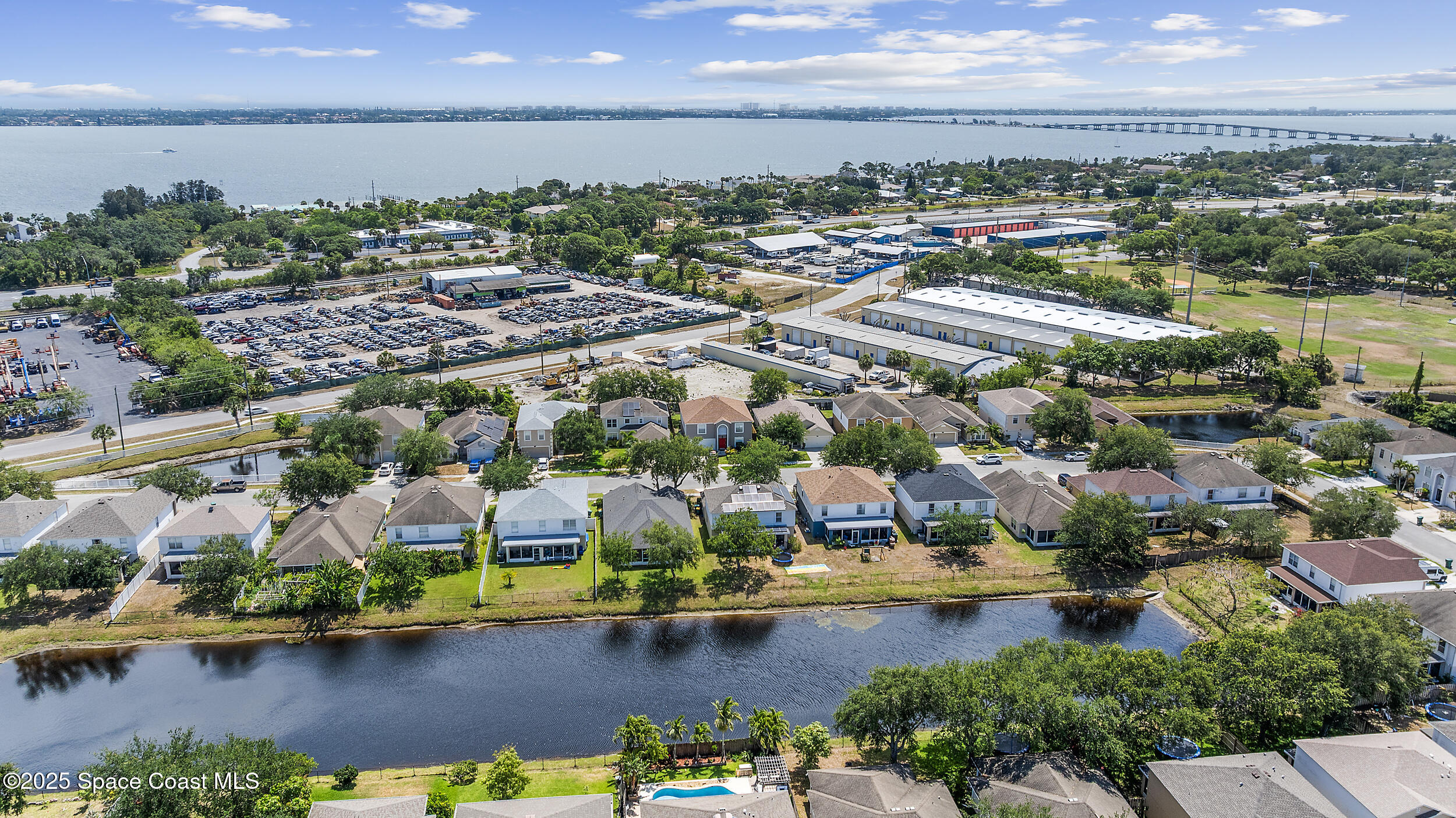 2100 Canopy Drive Melbourne, FL 32935 - Photo 22 of 53 an aerial view of residential houses with outdoor space