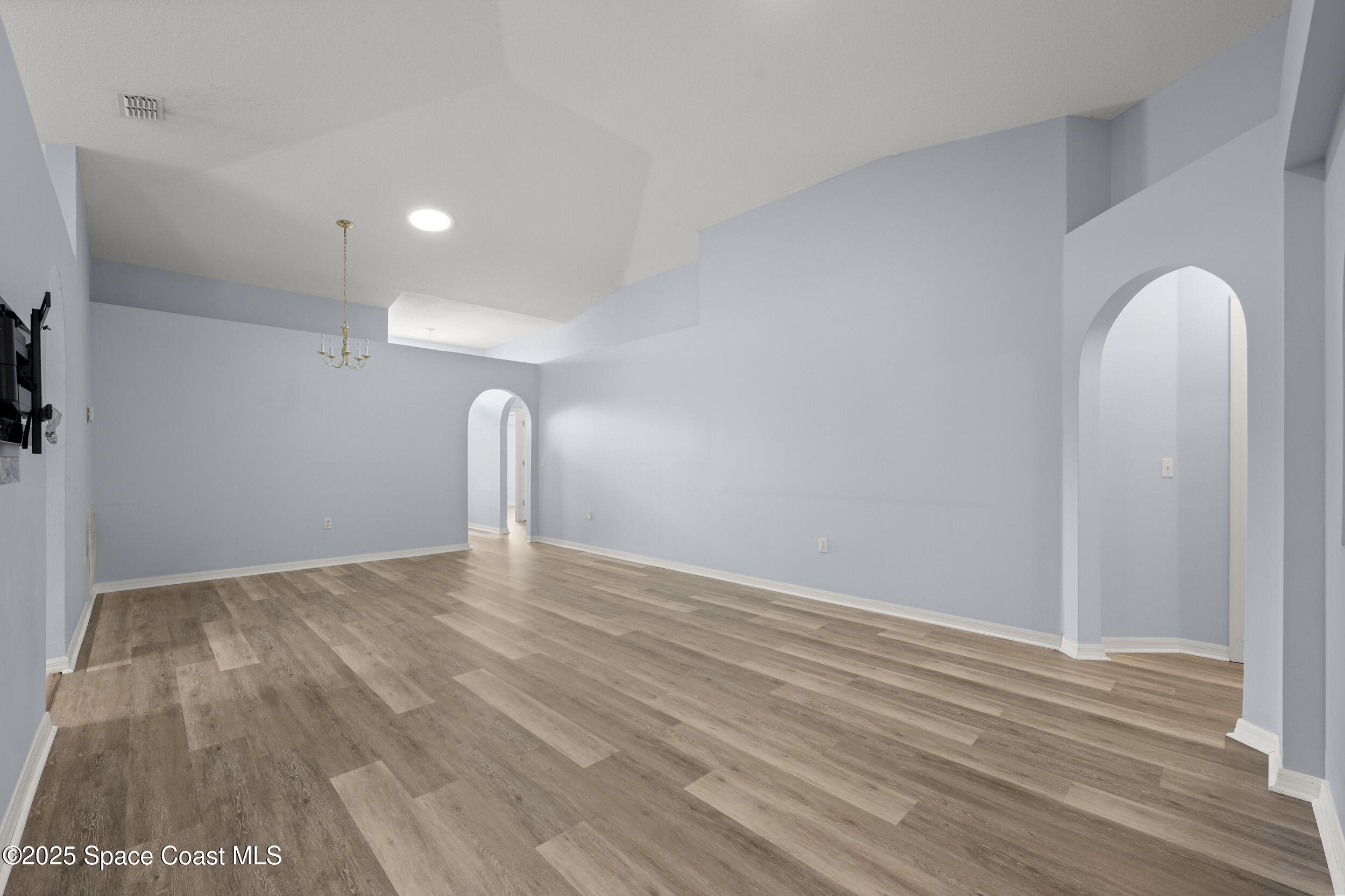 2100 Canopy Drive Melbourne, FL 32935 - Photo 23 of 53 a view of room with window and ceiling fan