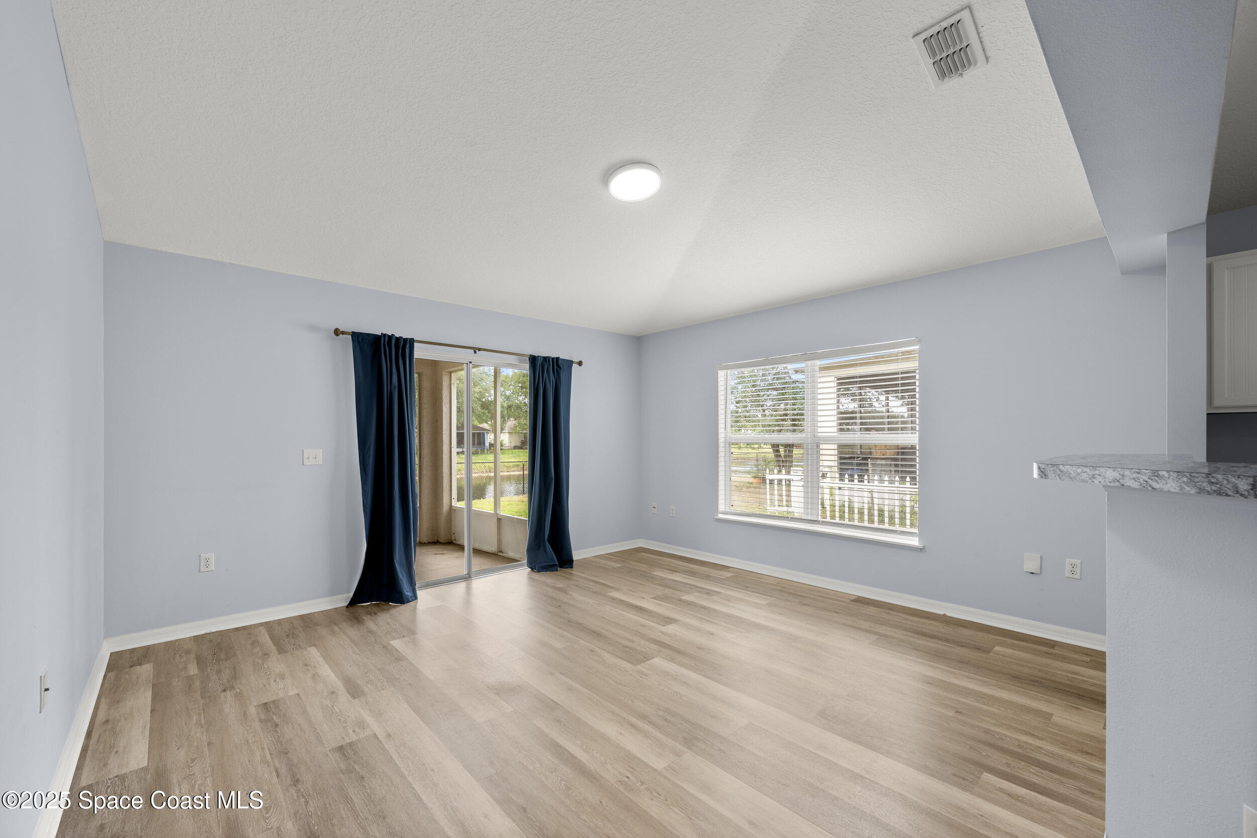 2100 Canopy Drive Melbourne, FL 32935 - Photo 26 of 53 a view of an empty room with a window