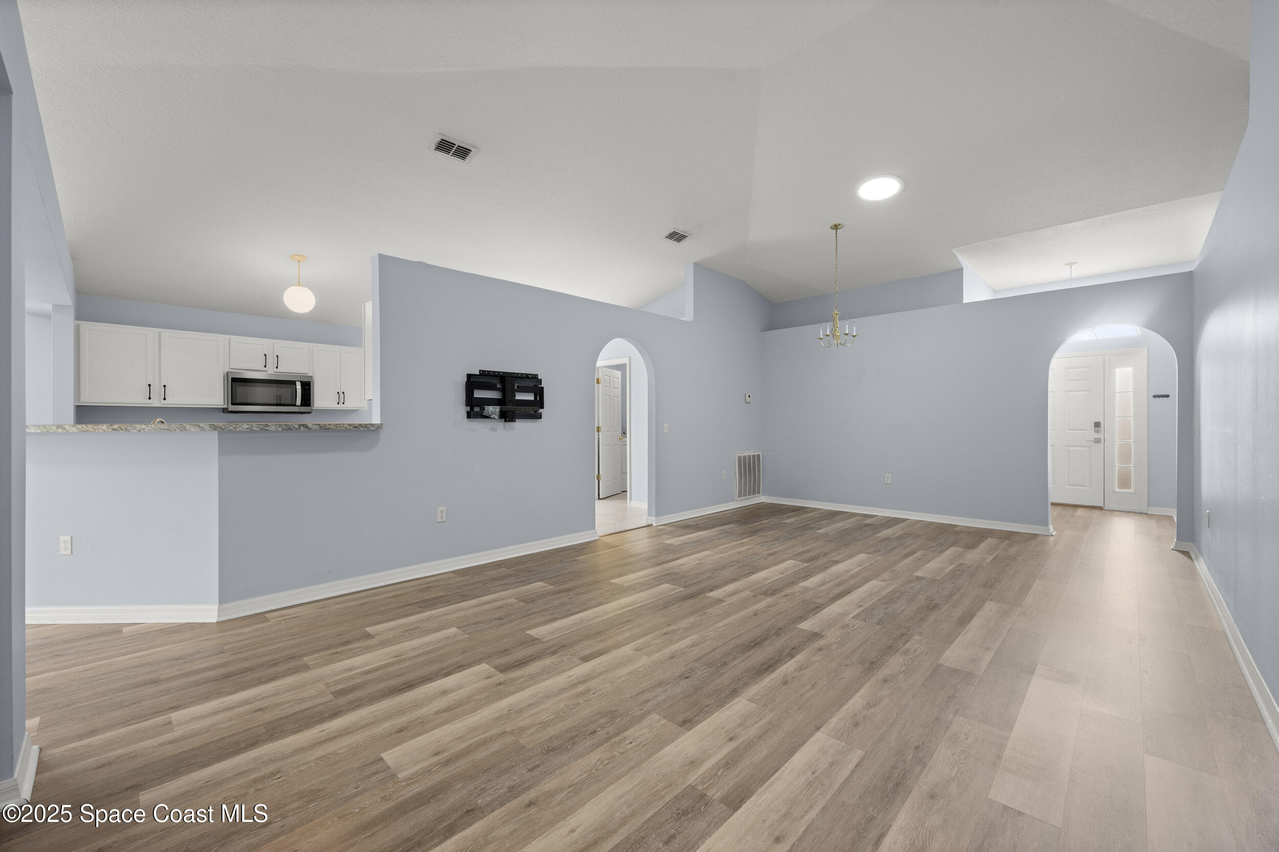 2100 Canopy Drive Melbourne, FL 32935 - Photo 3 of 53 a view of a kitchen with a sink and cabinets