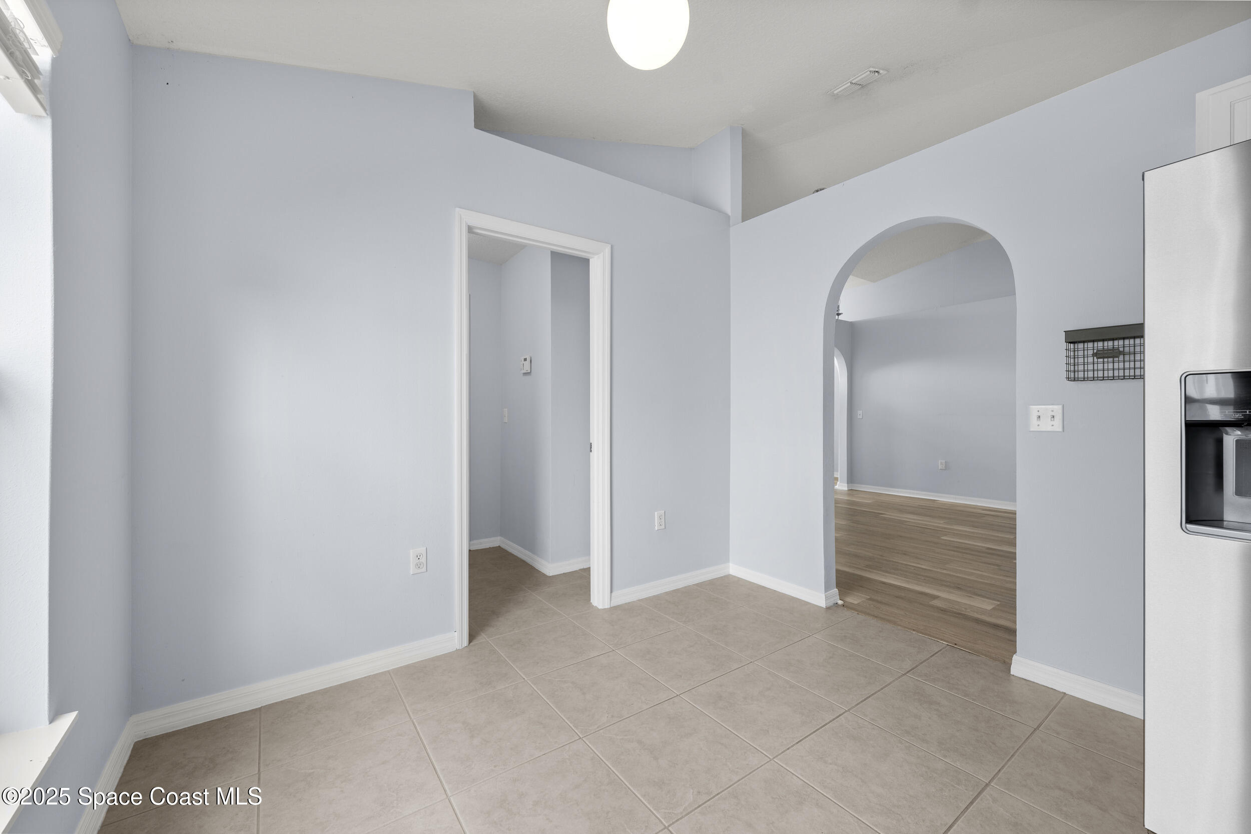 2100 Canopy Drive Melbourne, FL 32935 - Photo 32 of 53 a view of empty room with wooden floor