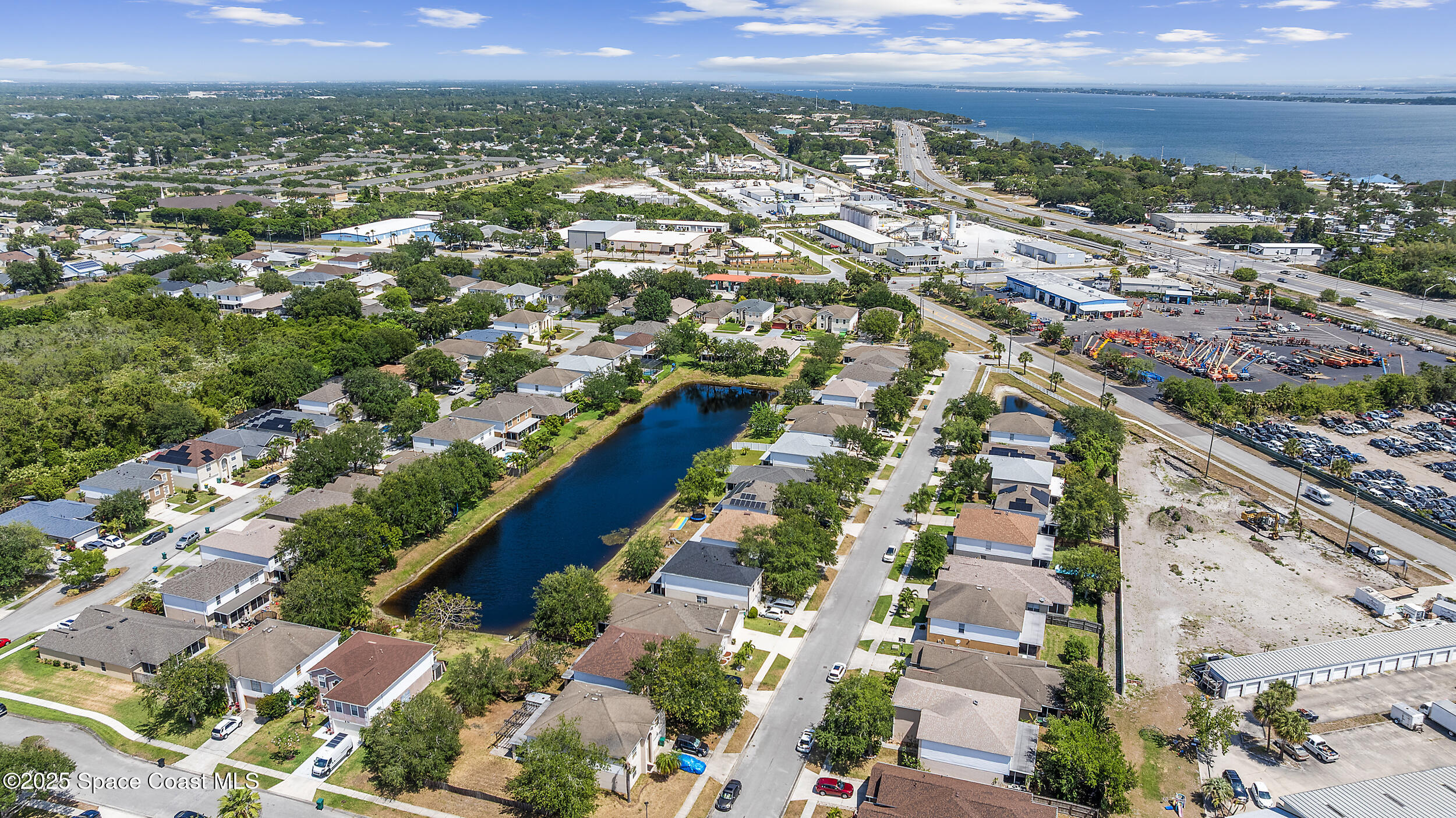 2100 Canopy Drive Melbourne, FL 32935 - Photo 53 of 53 an aerial view of residential houses with outdoor space