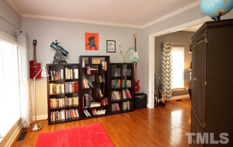 4113 Batiste Road Raleigh, NC 27613 - Photo 7 of 22 a view of a living room and dining room