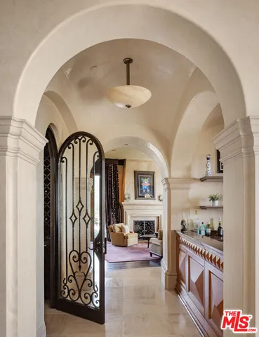 a view of a palm trees next to a road