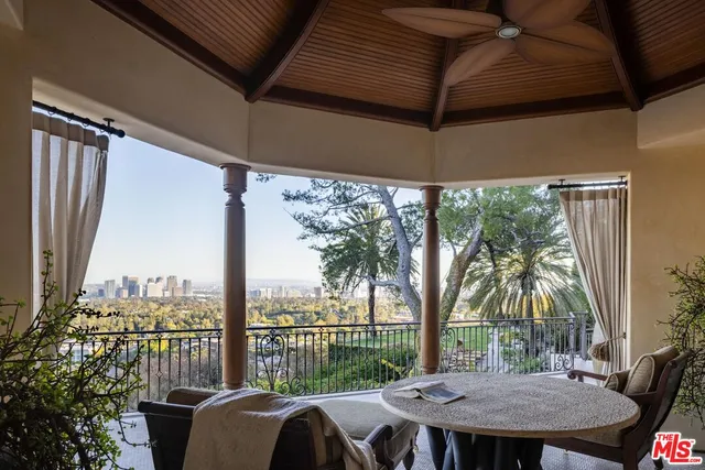 a view of a building with a lot of trees
