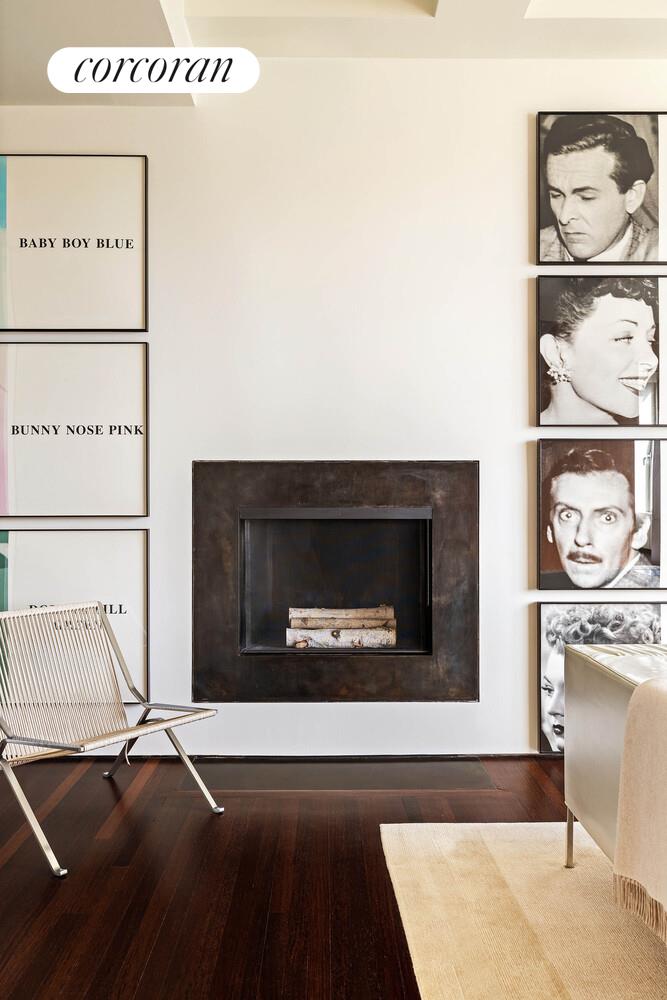 2 East 88th Street, Unit 10 Manhattan, NY 10128 - Photo 9 of 35 a living room with a fireplace