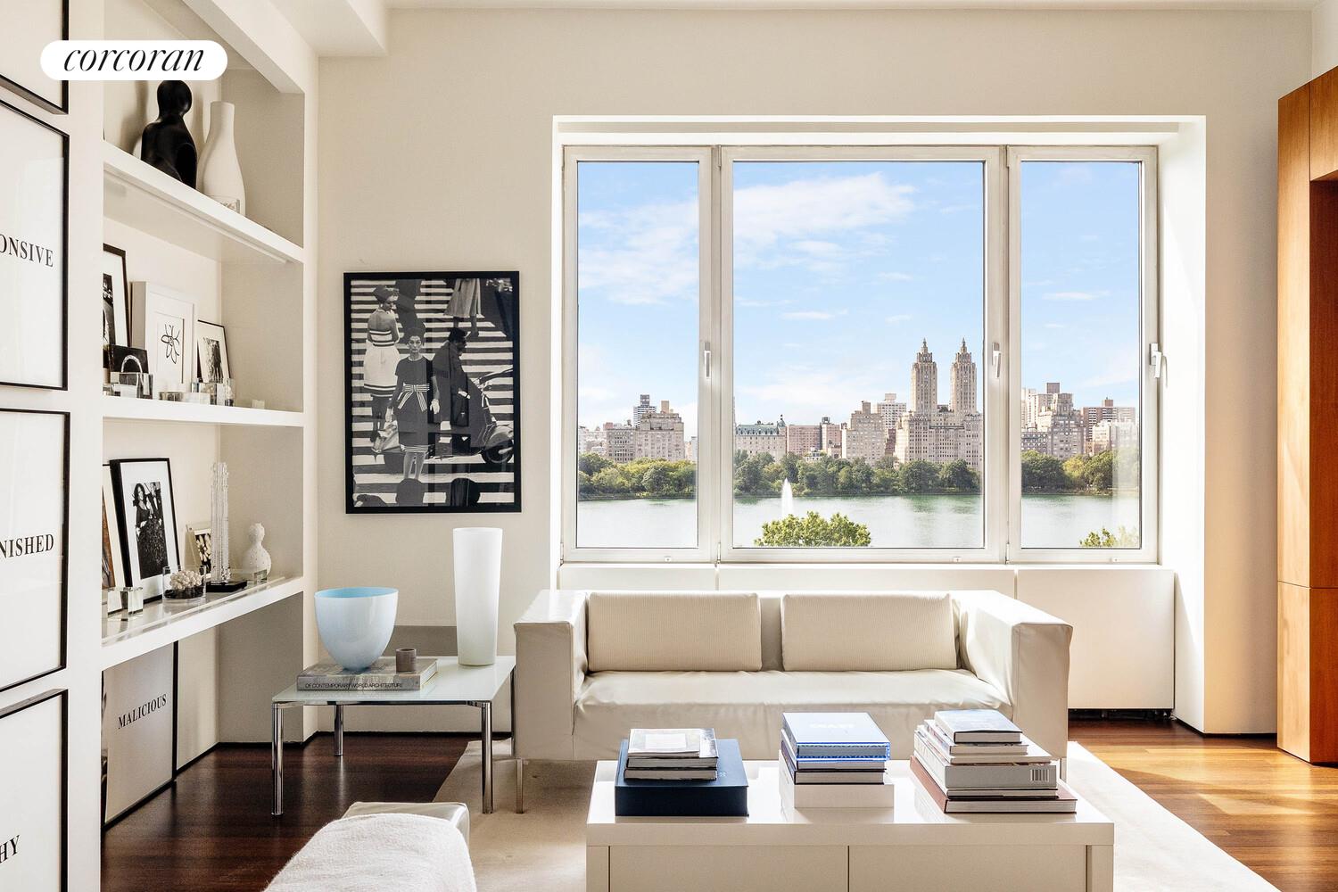 2 East 88th Street, Unit 10 Manhattan, NY 10128 - Photo 10 of 35 a living room with furniture and a large window