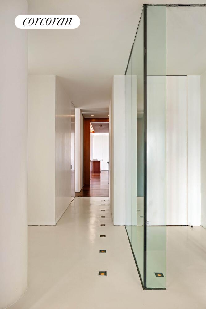 2 East 88th Street, Unit 10 Manhattan, NY 10128 - Photo 19 of 35 a view of a hallway with closet