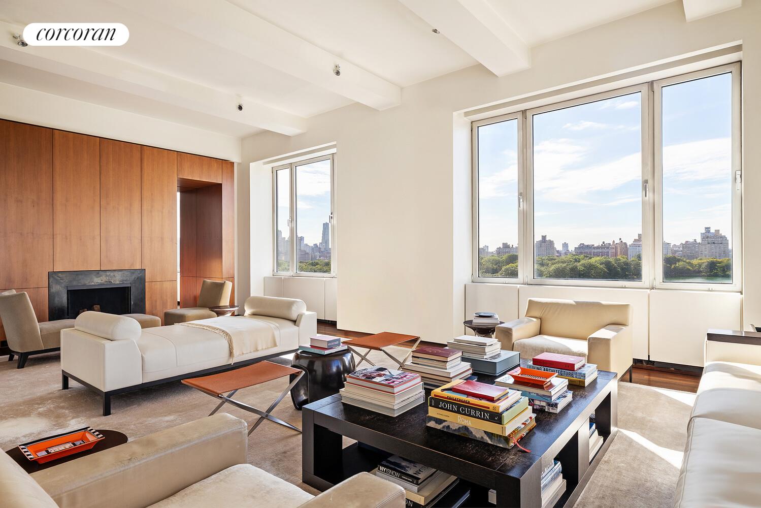 2 East 88th Street, Unit 10 Manhattan, NY 10128 - Photo 6 of 35 a living room with furniture and a large window