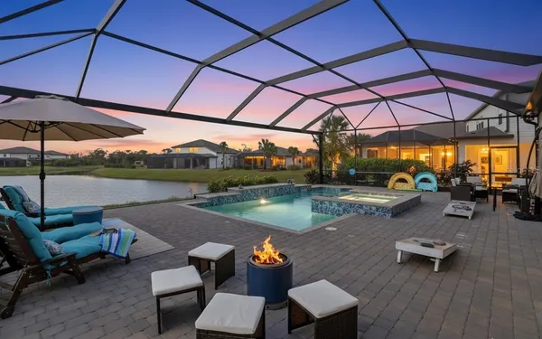 an aerial view of a house with outdoor space
