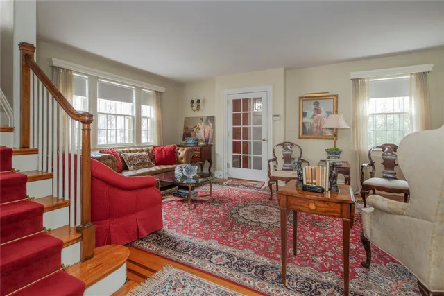 a living room with furniture or couch and a window
