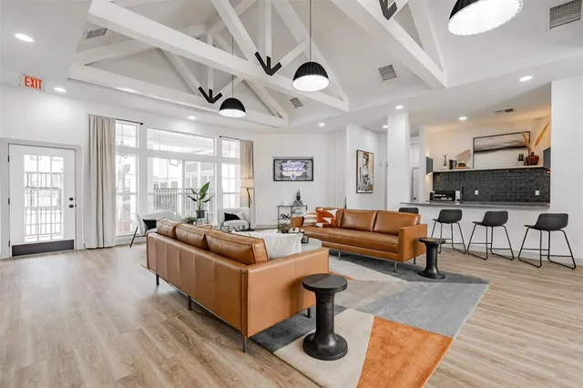a bathroom with a tub sink and toilet