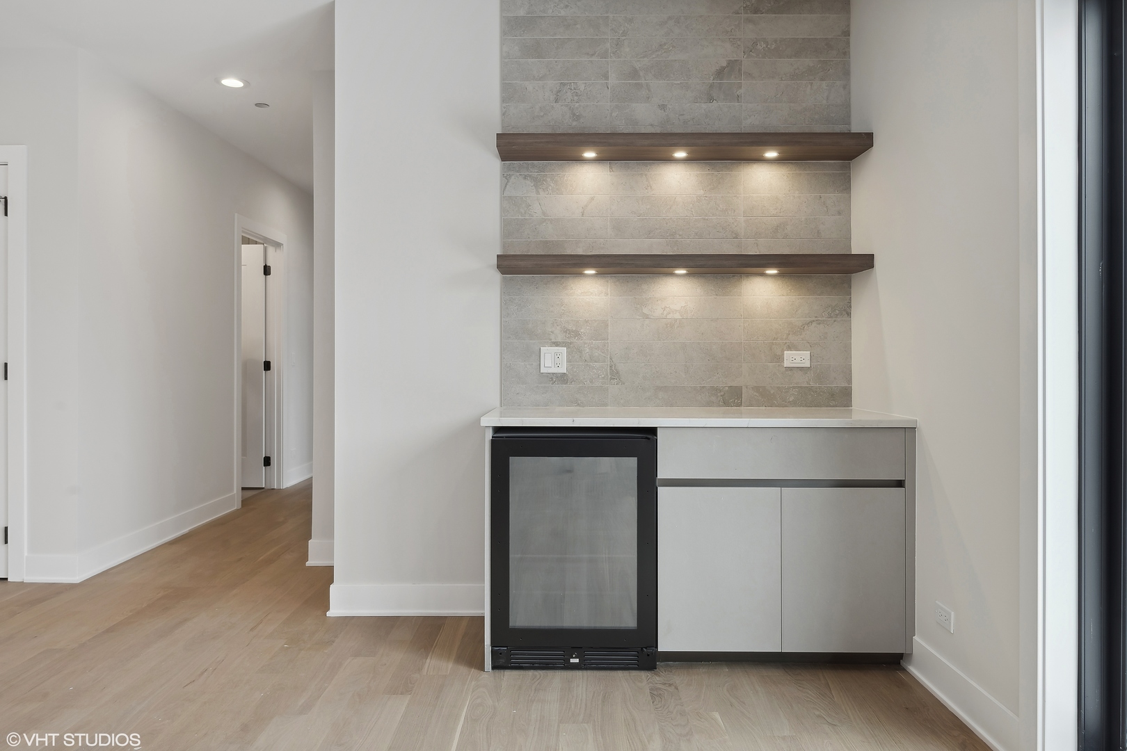 4537 North Clark Street, Unit 4D Chicago, IL 60640 - Photo 11 of 29 an empty room with wooden floor