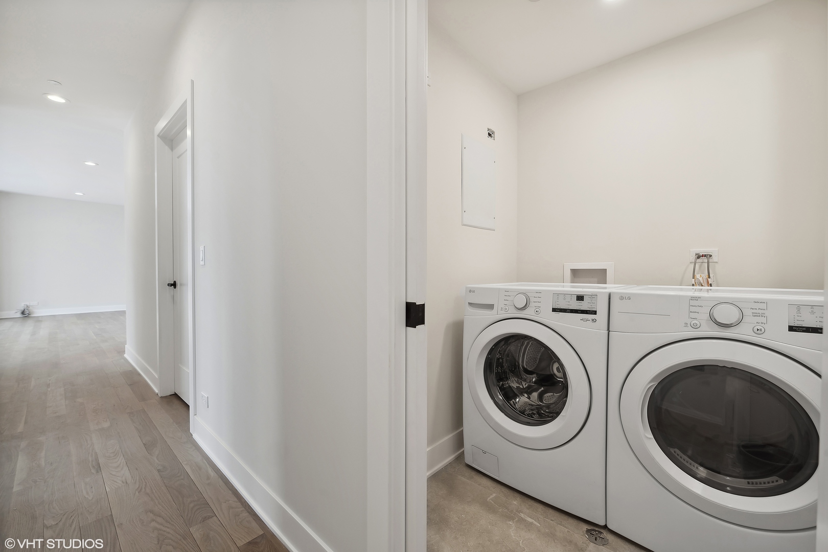 4537 North Clark Street, Unit 4D Chicago, IL 60640 - Photo 23 of 29 a view of a hallway with washer and dryer