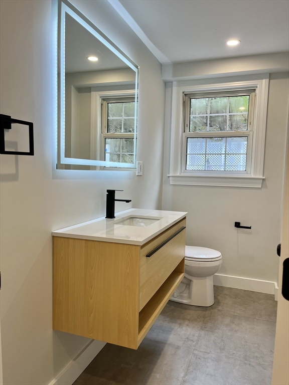 69 Brookside Road Braintree, MA 02184 - Photo 8 of 28 a bathroom with a sink and a toilet