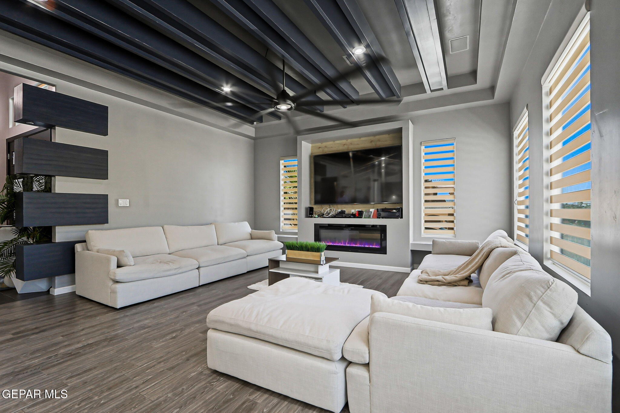5812 Sundale Road El Paso, TX 79912 - Photo 15 of 47 a living room with furniture and a flat screen tv