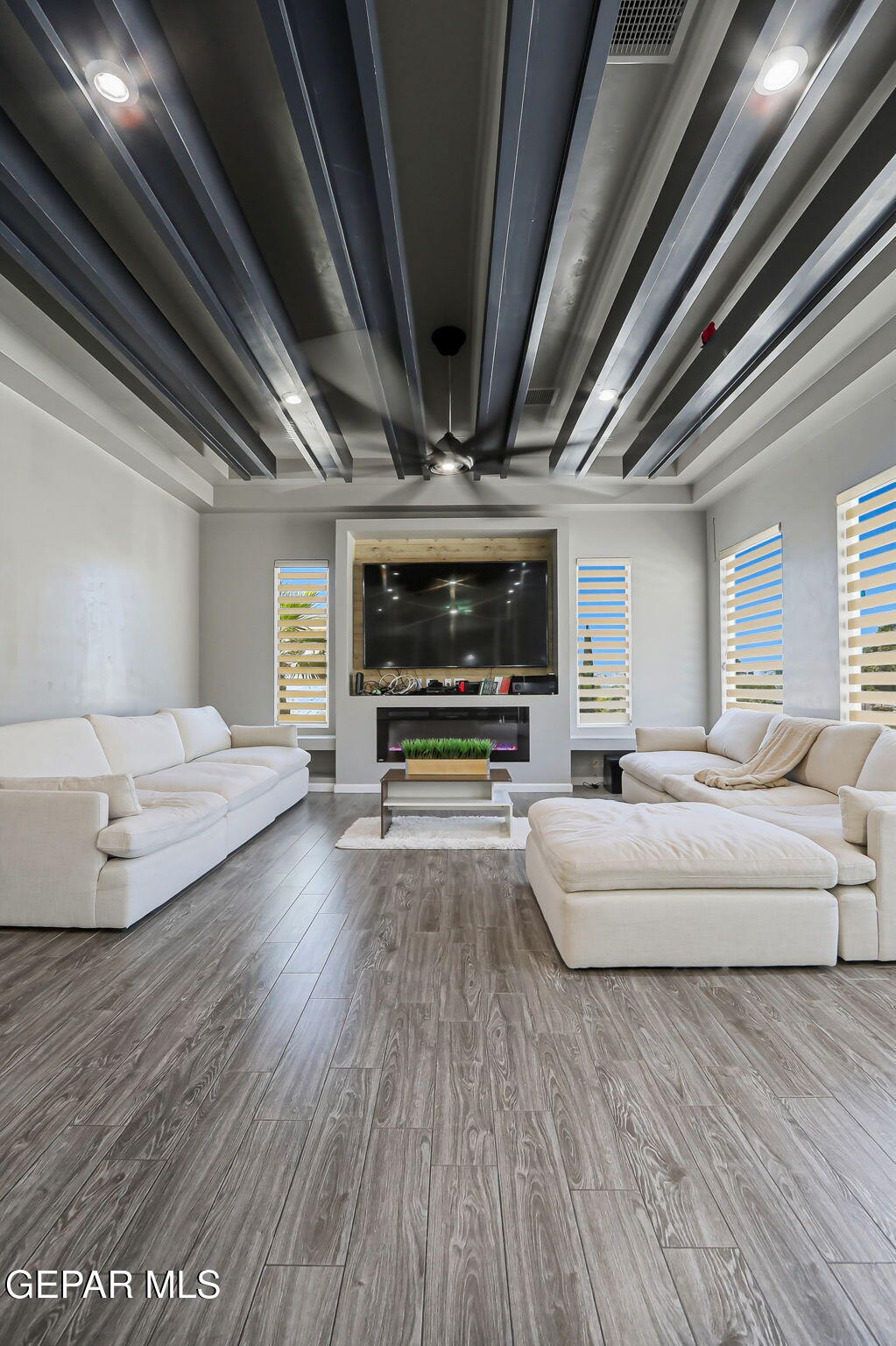 5812 Sundale Road El Paso, TX 79912 - Photo 18 of 47 a living room with furniture and a flat screen tv