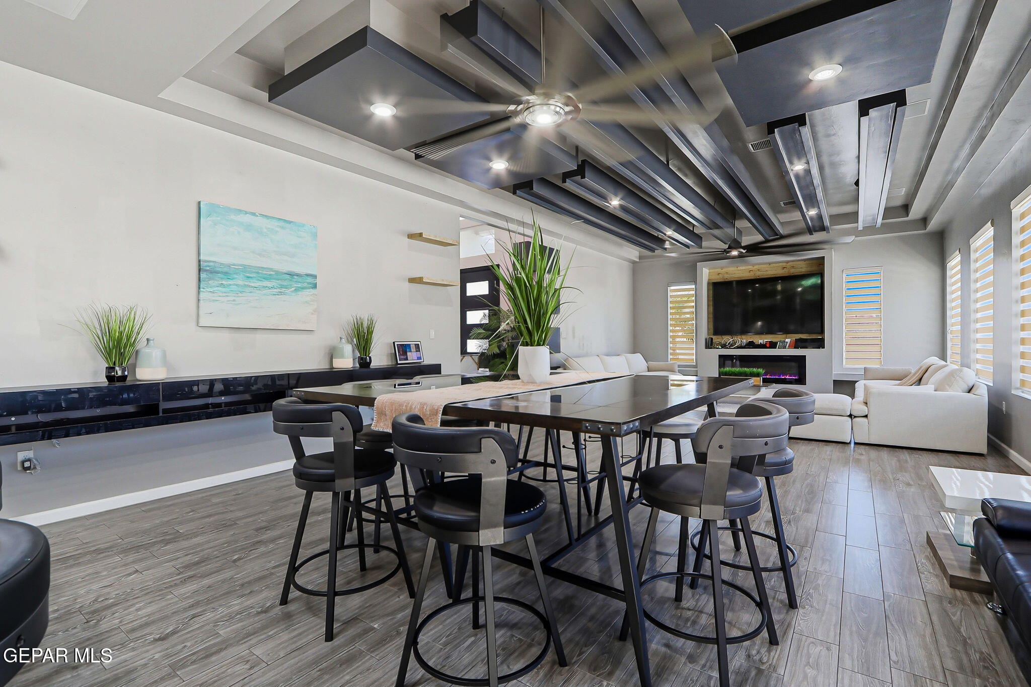 5812 Sundale Road El Paso, TX 79912 - Photo 20 of 47 a view of a dining room with furniture window and wooden floor