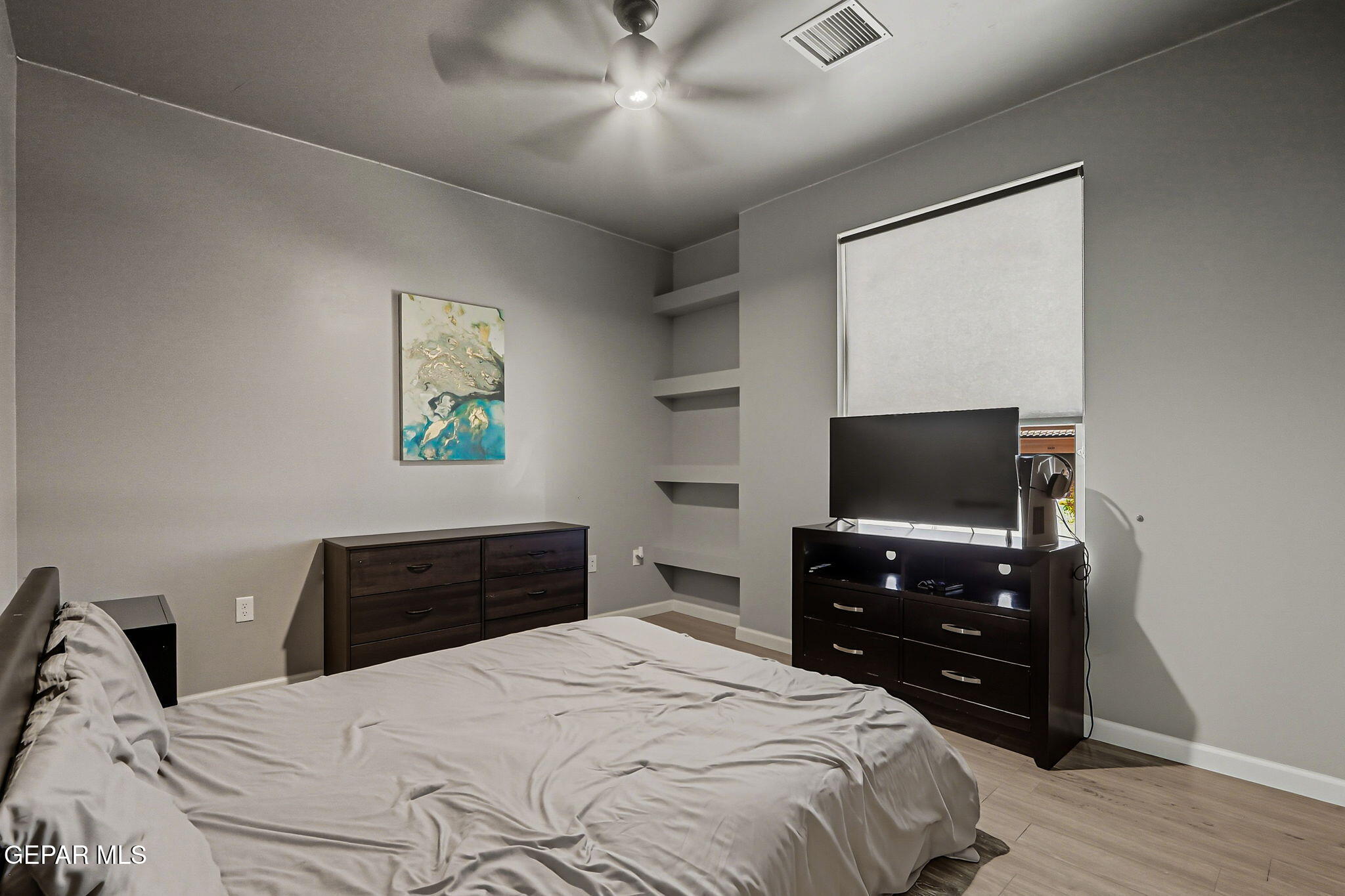 5812 Sundale Road El Paso, TX 79912 - Photo 28 of 47 a bedroom with a bed and a flat screen tv