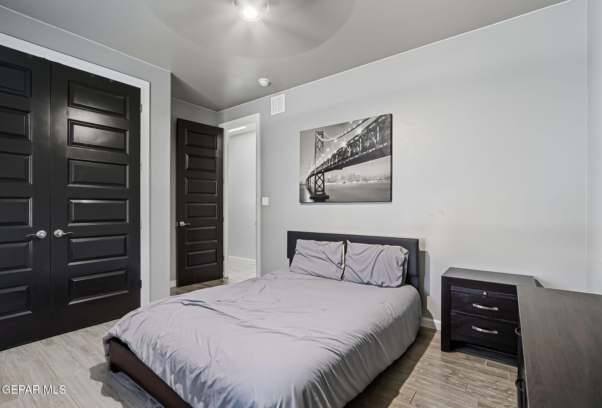 5812 Sundale Road El Paso, TX 79912 - Photo 29 of 47 a bedroom with a bed and a closet