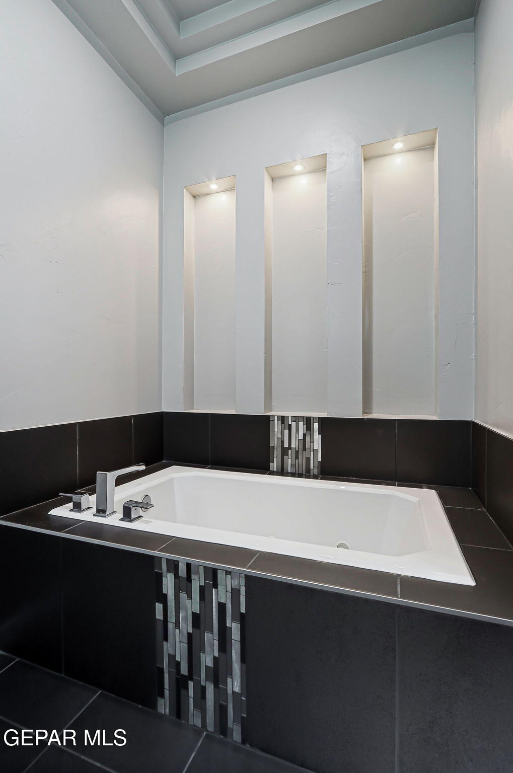 5812 Sundale Road El Paso, TX 79912 - Photo 39 of 47 a bathroom with a sink and a mirror